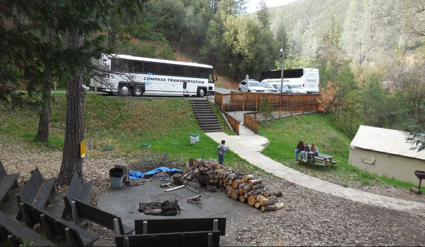 bus parking and fire pit gathering area